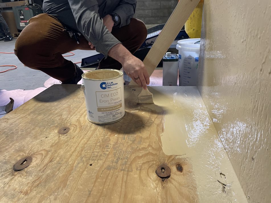 CIM EcoEpoxy Primer being applied to a wood substrate